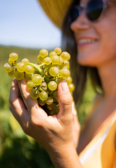 Woman with grapes
